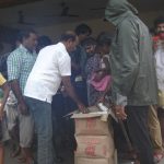 Helped People During Flood by providing biscuits DR.S.RAJENDRAN