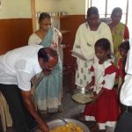 Helped People During Flood by providing biscuits DR.S.RAJENDRAN