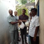 DR.S.RAJENDRAN AINP PRESIDENT Provided rice for Association Members families During flood