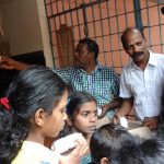Helped People During Flood by providing biscuits DR.S.RAJENDRAN