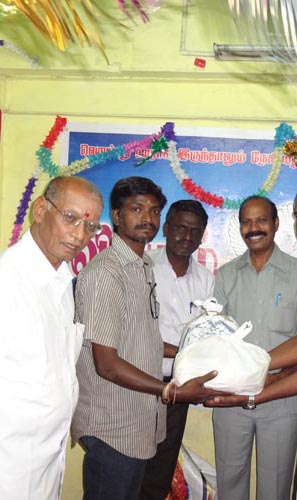 DR.S.RAJENDRAN AINP PRESIDENT Provided rice for Association Members families During flood